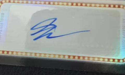 Close-up of the on-card blue-ink signature inside the Topps Certified autograph box of the rookie autograph card