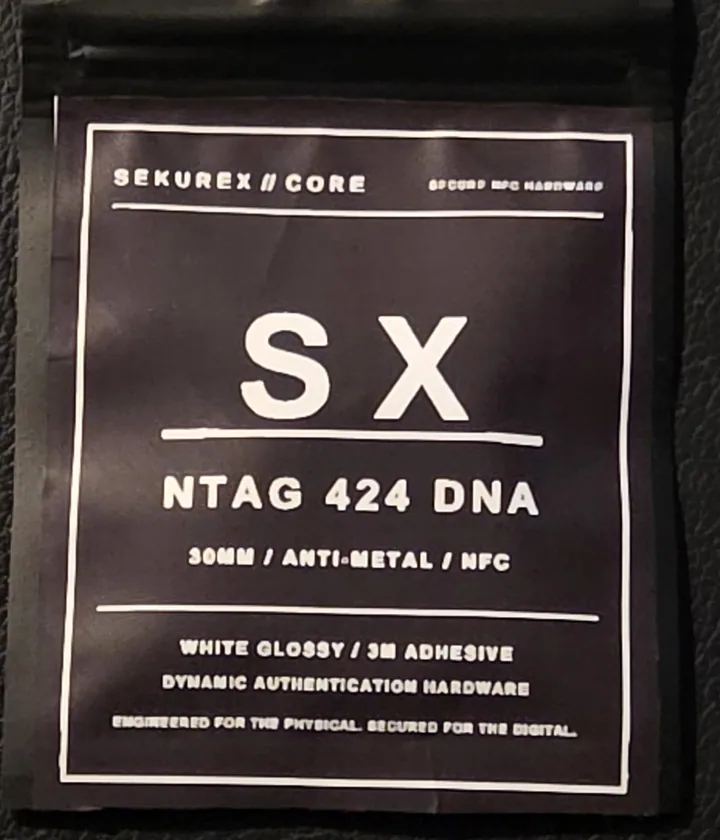 Sealed Sekurex Core pack of NTAG 424 DNA 30 mm anti-metal NFC stickers, white glossy with 3M adhesive